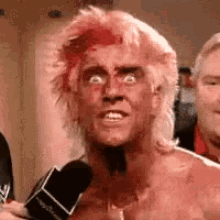 wrestler-woo.gif.19673d6acefea8e96de4bc7626b9b28c.gif