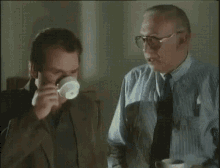 inspector-drinking-coffee.gif.5b63e9d5834050901a3e1ae02cfe2193.gif