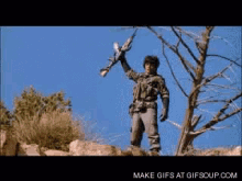 wolverines-gun.gif.25ba328115a9aeba3c65062870486333.gif
