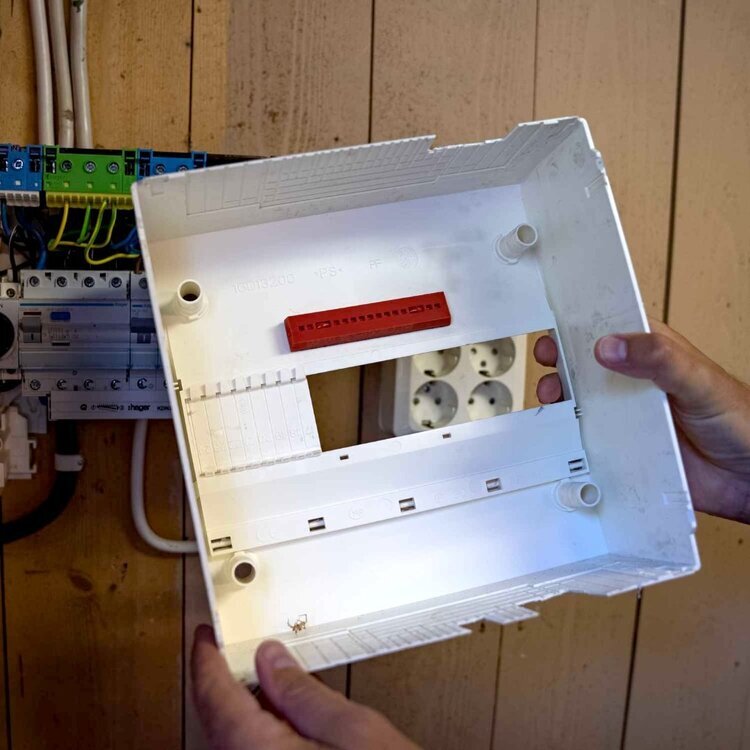 electric-enclosure-inside-hands-optimized-stixxpro-small.jpg
